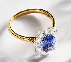 Gold ring with blue gem